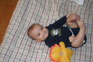 Tickling his own toes now